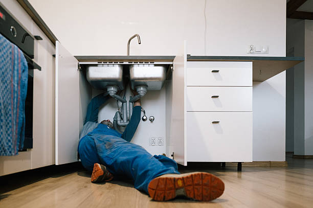 Professional Emergency Plumber technician working in Fulton, NY